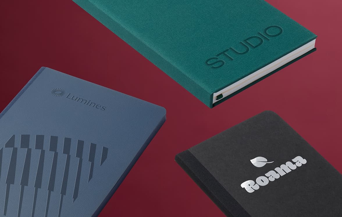 Set of MOO Hardcover and Softcover Notebooks on display